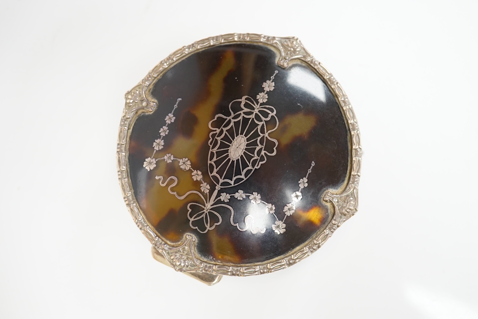 A George V silver and tortoiseshell pique mounted trinket box, by Mappin & Webb, Birmingham, 1918, circular diameter 94mm Condition - fair to good